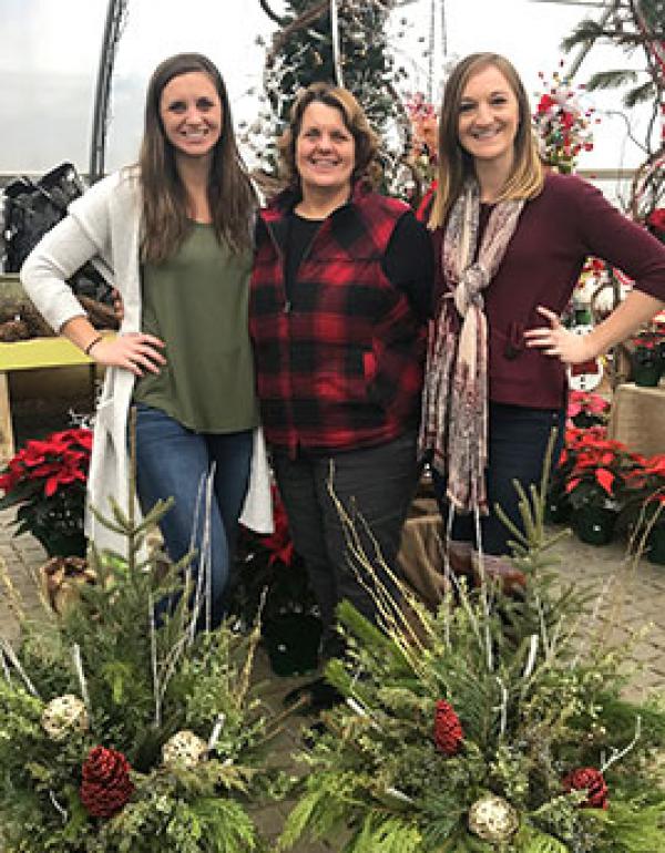 Mom and daughters at workshop